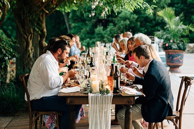 Helen and Chris: A Micro Wedding in Lancaster PA - guests eat at one table to celebrate