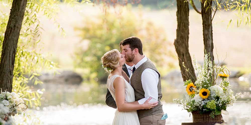 Lancaster Rustic Wedding ceremony lakeside kiss